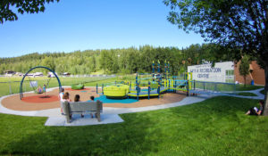 Quesnel Arts & Rec Inclusive Playground with rubber surfacing