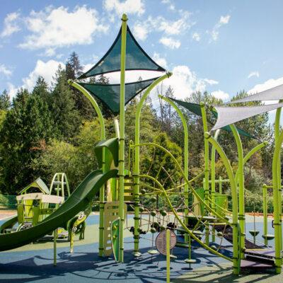 green playground on rubber surfacing