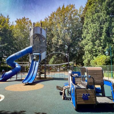 blue, brown and gray playground on pour-in-place (PIP) rubber surfacing