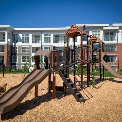 brown and green playground, habitat systems natural playspace with engineered wood fibre (EWF) surfacing