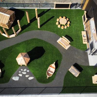 Natural Play Playground - Outdoor Learning Environment playground on artificial turf & pour-in-place (PIP) rubber surfacing