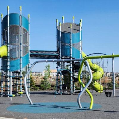 blue, green and gray / silver playground on pour in place (PIP) rubber surfacing